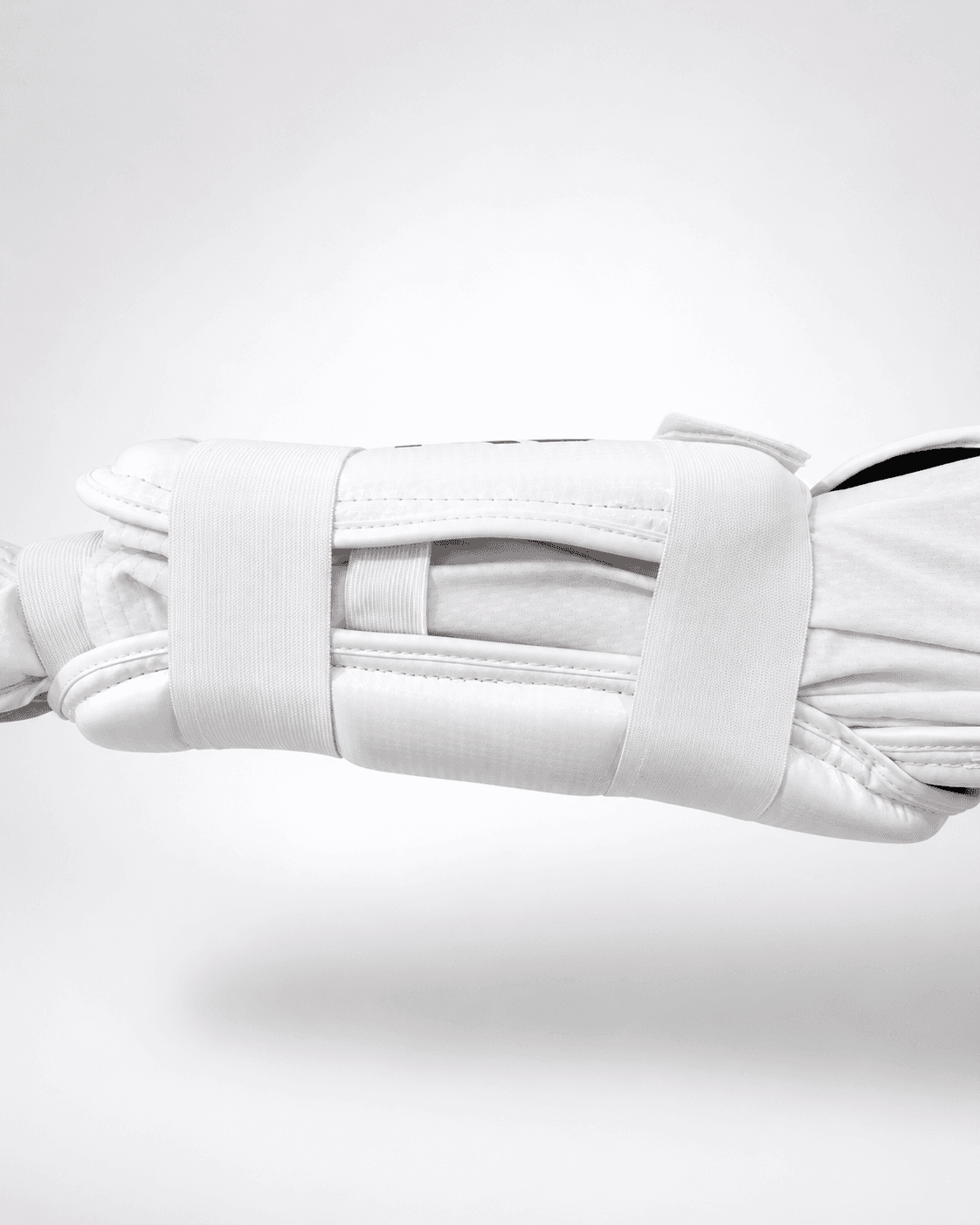 Arm Ultra inner construction - elastic strap system showing 90% forearm wrap coverage