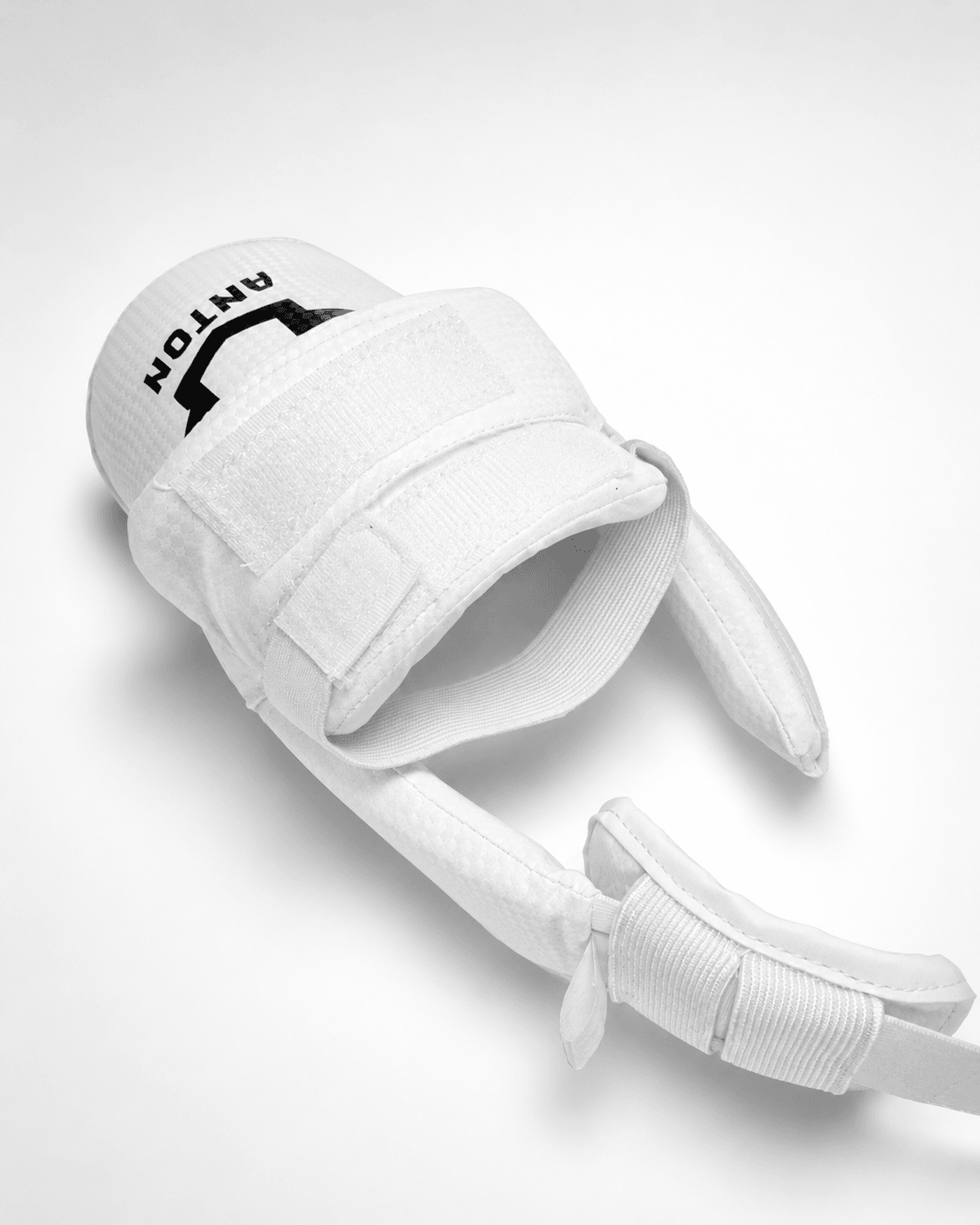 Anton foot protector worn, instep view - the second strap wrapped around the ankle joint above the heel strap