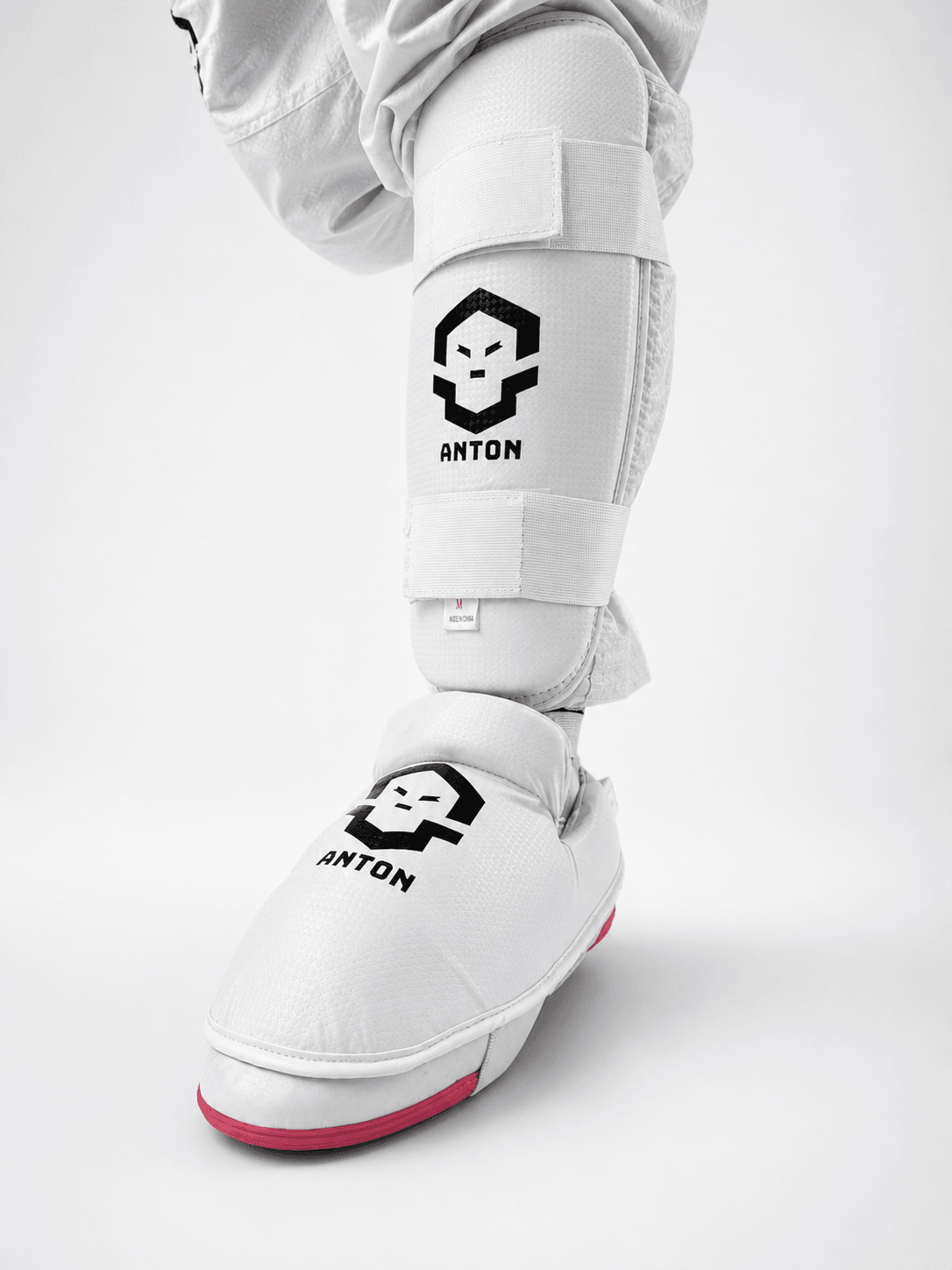 Anton Leg Ultra worn - shin guard and foot protector on one leg, the ankle strap on the foot protector visible